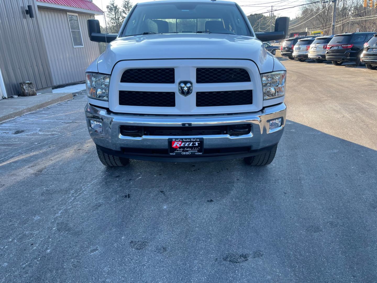 2016 White /Black RAM 2500 Outdoorsman Crew Cab SWB 4WD (3C6UR5DL4GG) with an 6.7L I6 OHV 24V TURBO DIESEL engine, 6A transmission, located at 11115 Chardon Rd. , Chardon, OH, 44024, (440) 214-9705, 41.580246, -81.241943 - Photo#1